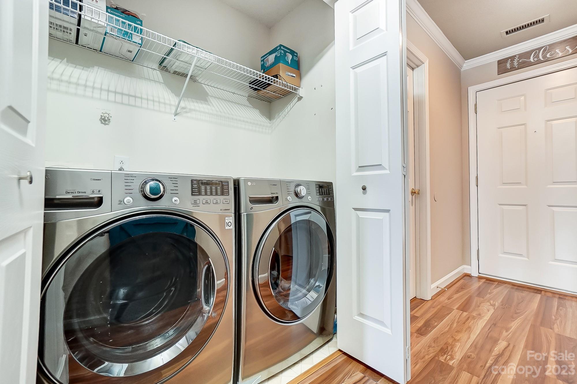 1230 Torrence Circle Davidson, NC 28036 - Photo 22 of 23 a utility room with dryer and washer