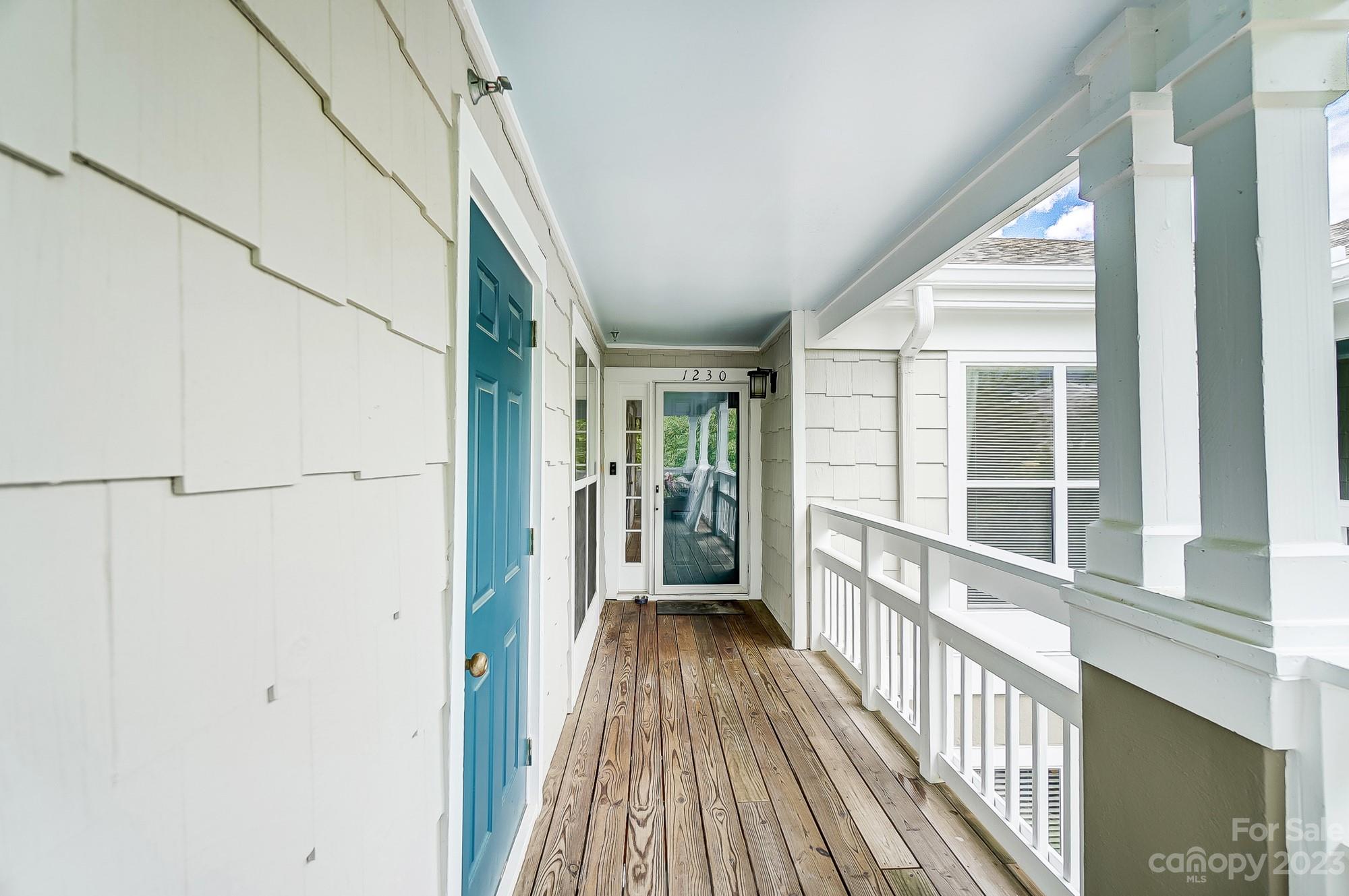 1230 Torrence Circle Davidson, NC 28036 - Photo 5 of 23 a view of a house with wooden floor and iron stairs