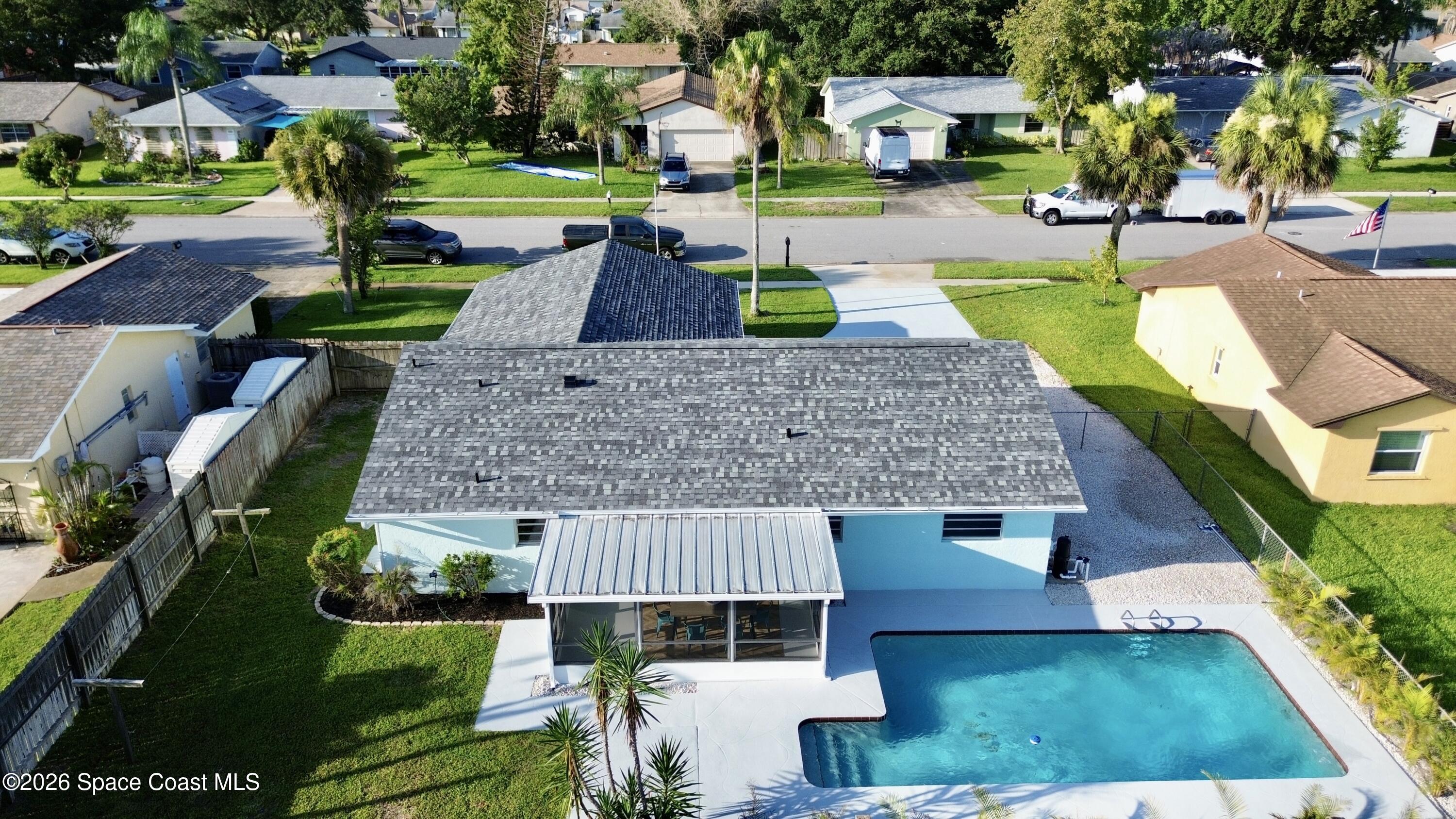 1910 Tallridge Road Melbourne, FL 32935 - Photo 29 of 34 drone back