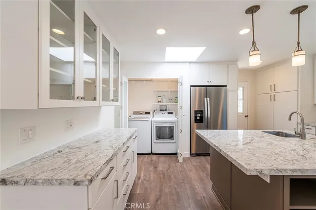 a utility room with washer and dryer