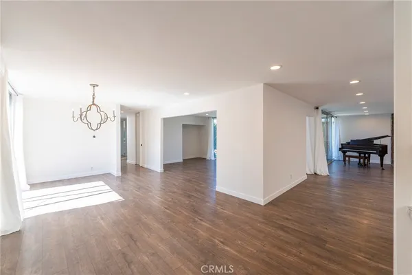 a view of a livingroom with wooden floor