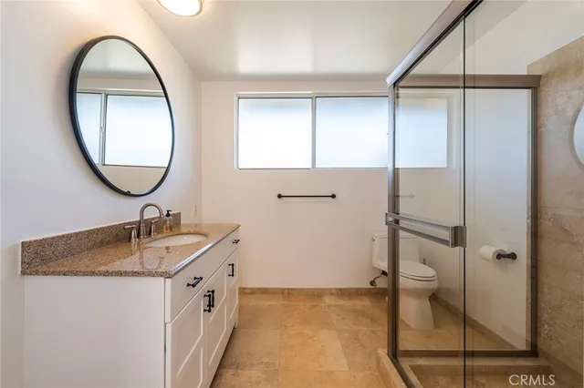 an empty room with an outdoor view and a window