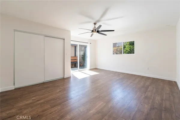 a view of an empty room and window