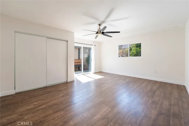 a view of an empty room and window