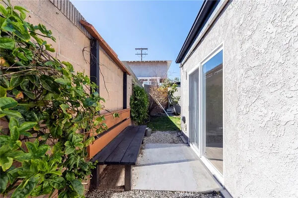 an aerial view of a residential houses with city view