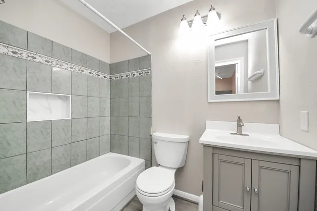 an aerial view of houses with yard