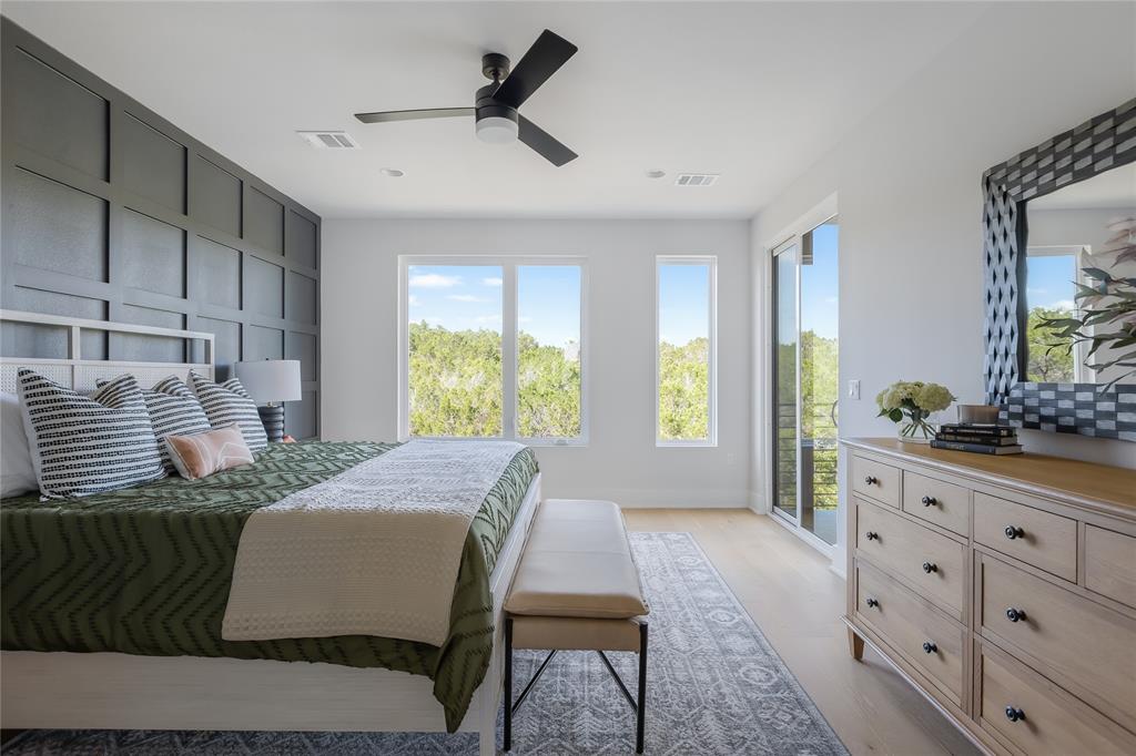 7809 Old Bee Caves Road, Unit 20 Austin, TX 78735 - Photo 7 of 28 a bed room with a bed window and mirror