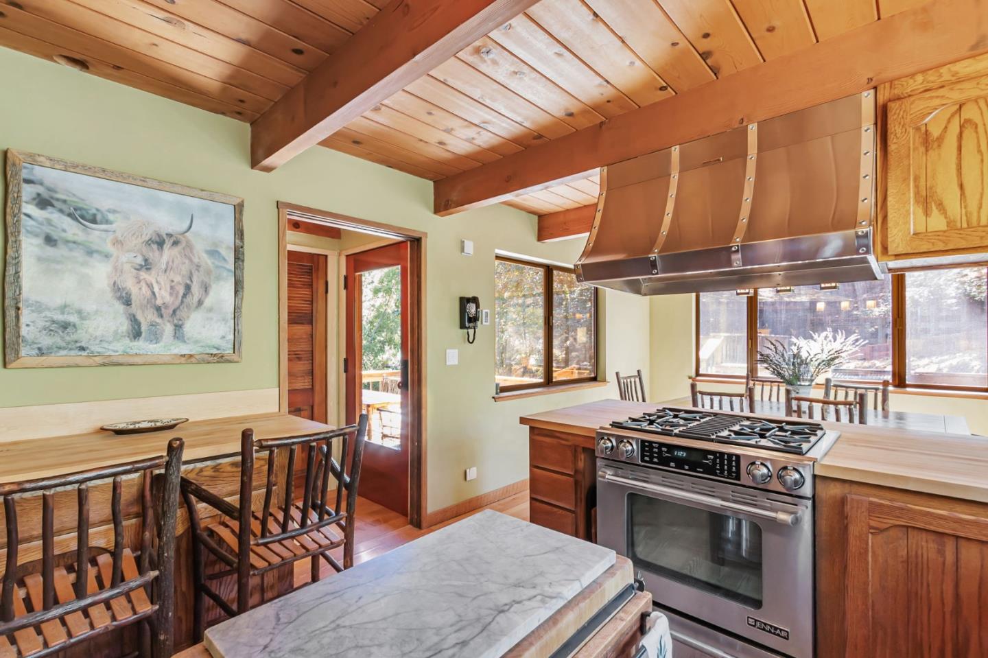 855 Oak Ridge Road Los Gatos, CA 95033 - Photo 16 of 73 a kitchen with stainless steel appliances granite countertop a stove a sink dishwasher and cabinets with wooden floor