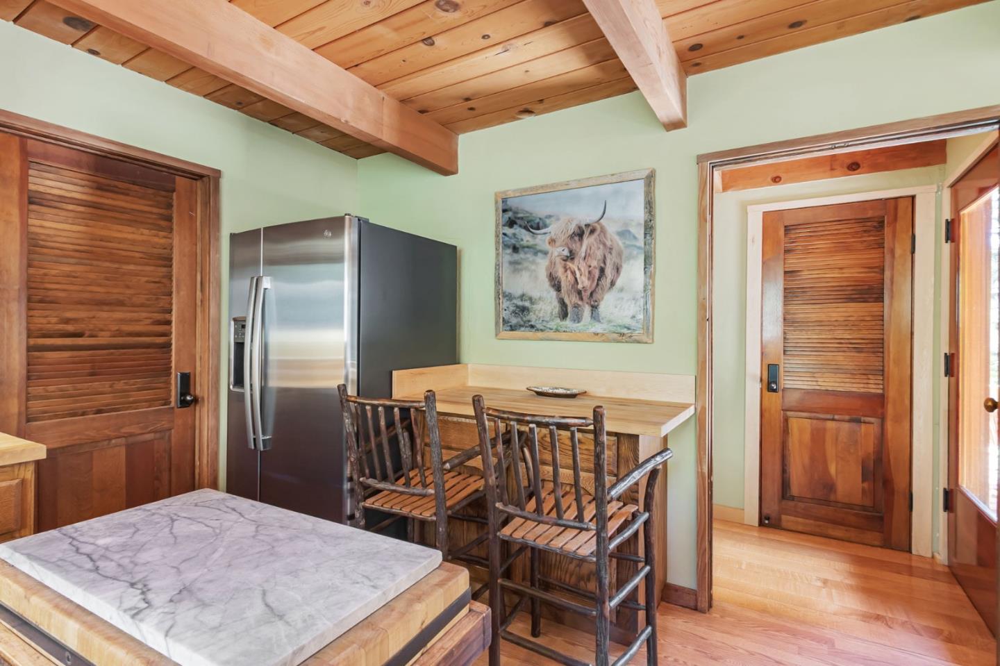 855 Oak Ridge Road Los Gatos, CA 95033 - Photo 17 of 73 a view of a dining room with furniture and wooden floor