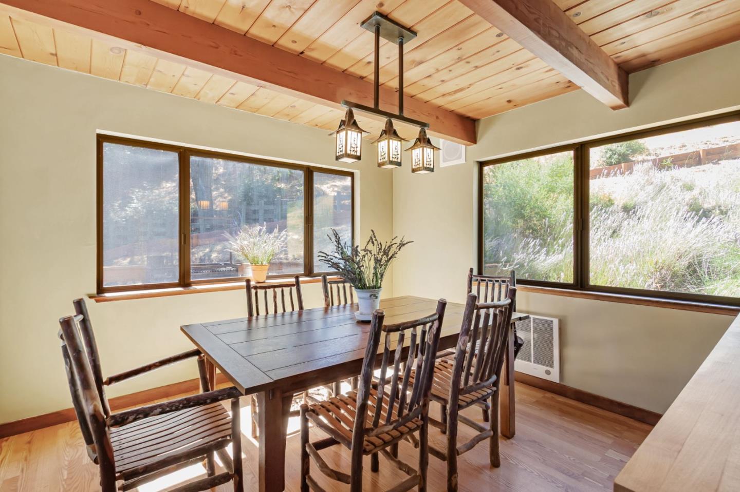 855 Oak Ridge Road Los Gatos, CA 95033 - Photo 20 of 73 a view of a dining room with furniture window and wooden floor