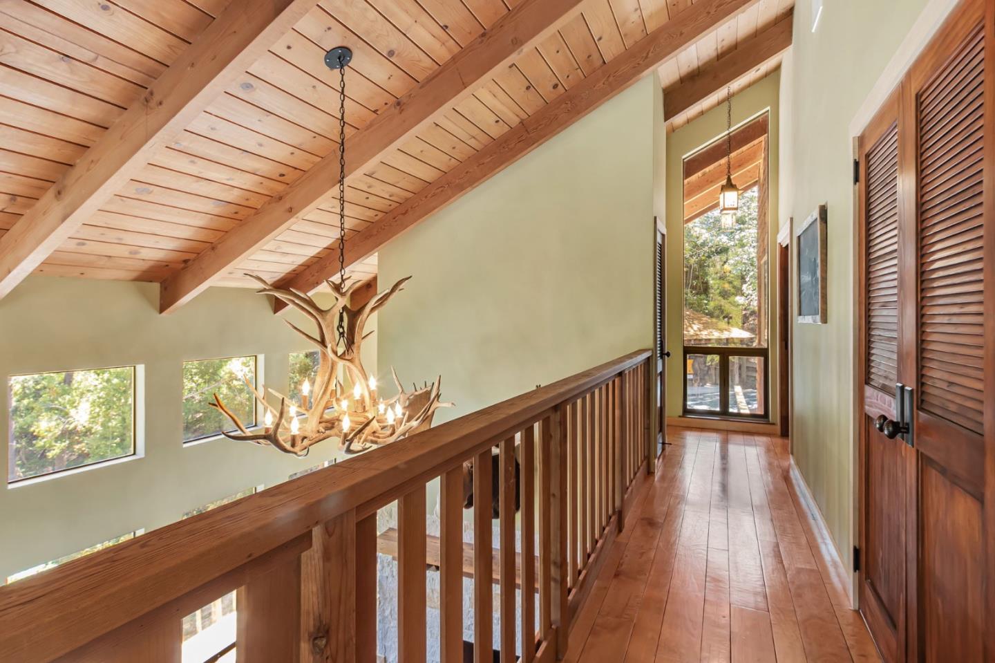 855 Oak Ridge Road Los Gatos, CA 95033 - Photo 25 of 73 a view of a porch with wooden floor and stairs