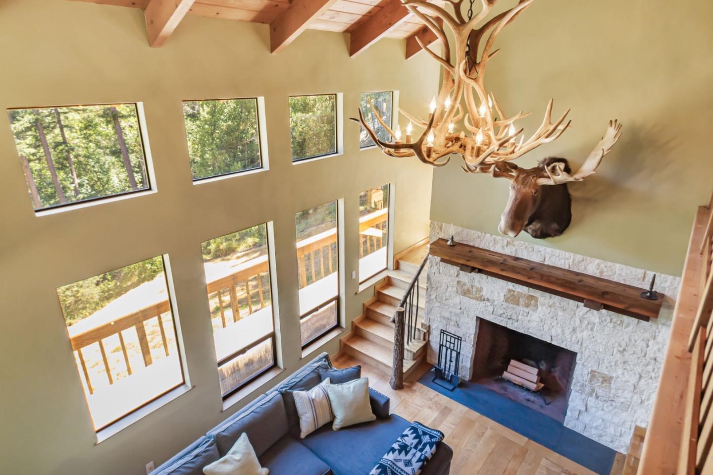855 Oak Ridge Road Los Gatos, CA 95033 - Photo 26 of 73 a living room with furniture and a fireplace