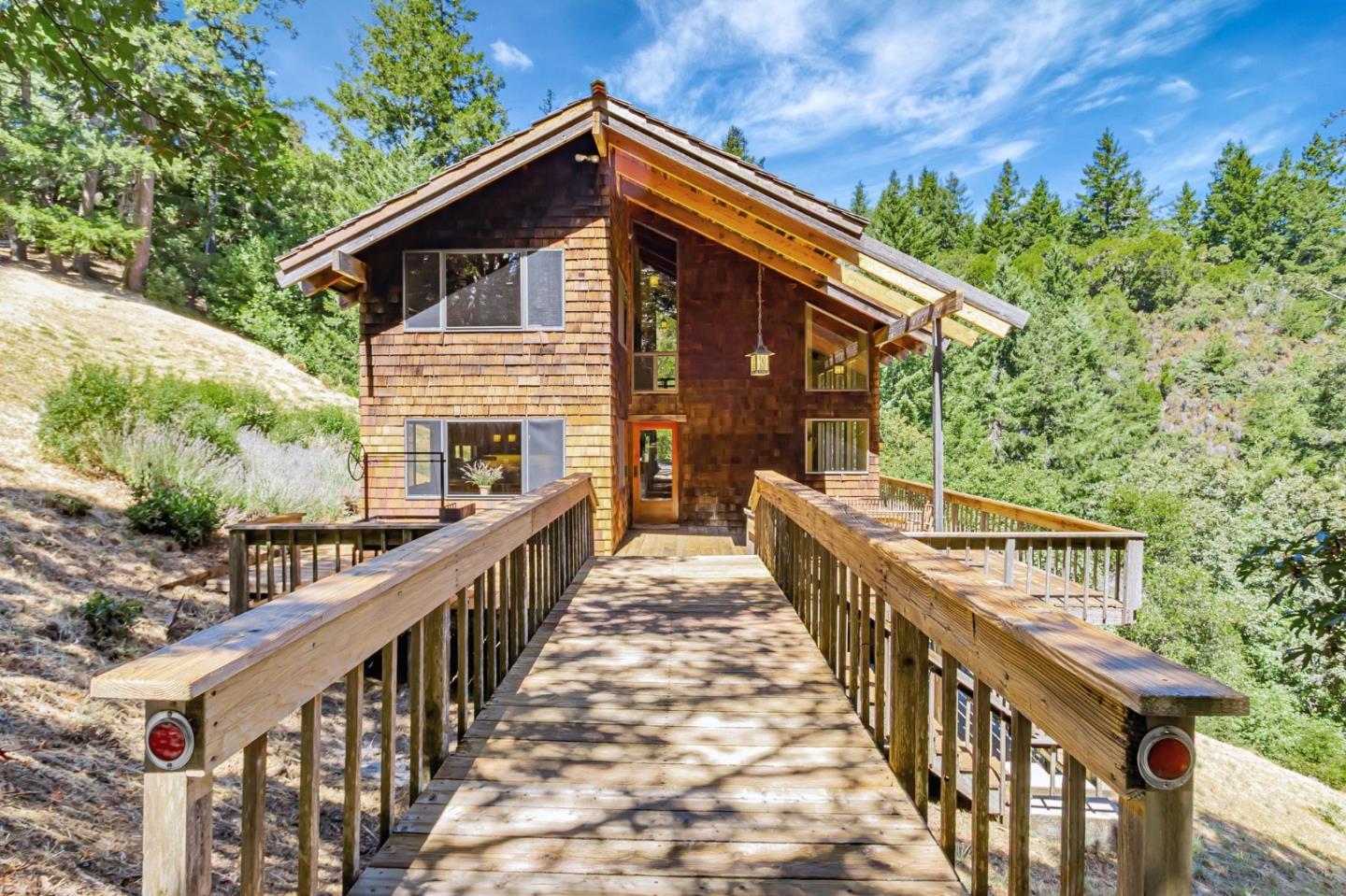 855 Oak Ridge Road Los Gatos, CA 95033 - Photo 3 of 73 a view of house with wooden deck and trees