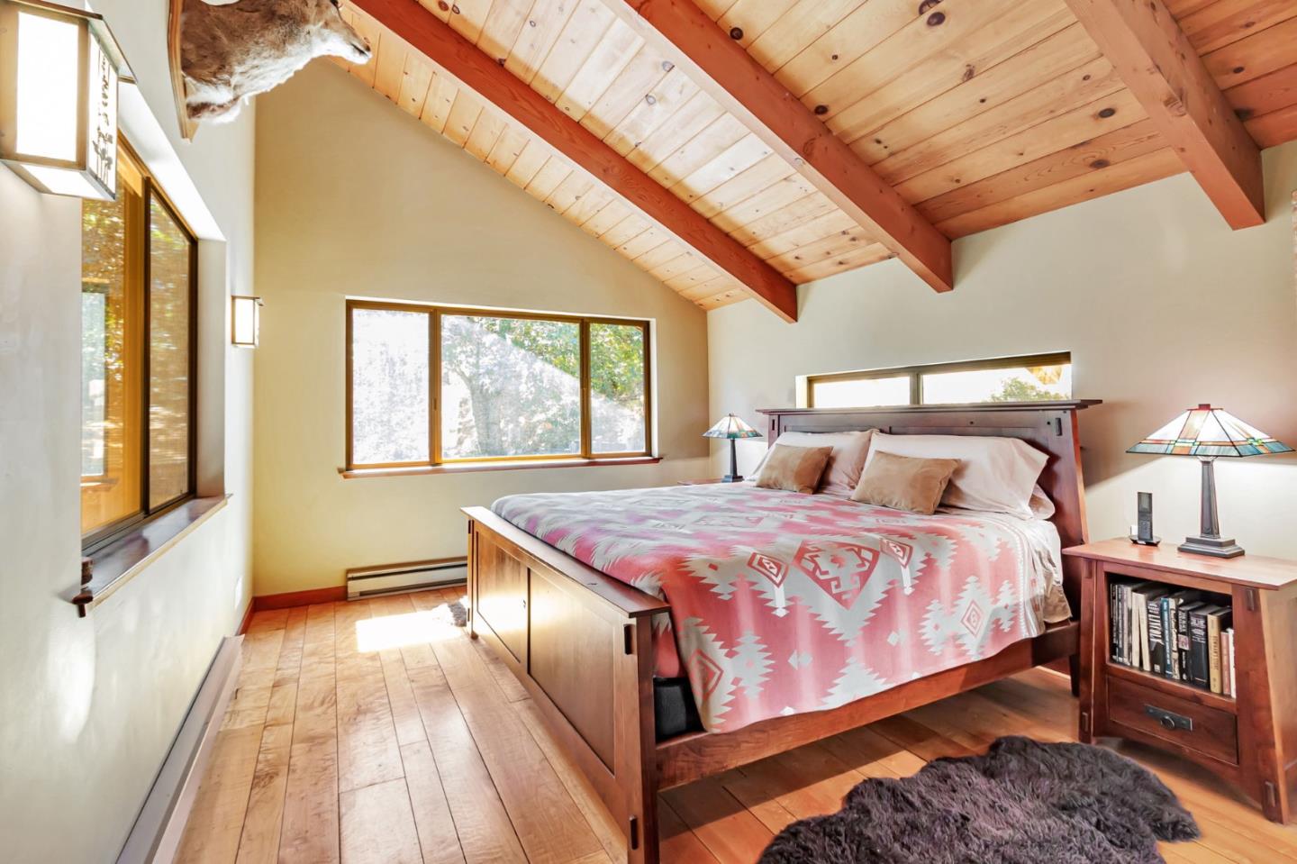 855 Oak Ridge Road Los Gatos, CA 95033 - Photo 33 of 73 a bed sitting in a bedroom next to a window