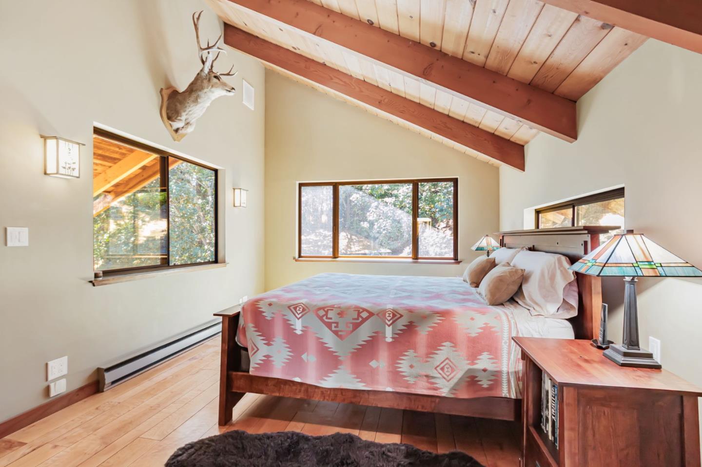 855 Oak Ridge Road Los Gatos, CA 95033 - Photo 34 of 73 a bedroom with bed and wooden floor