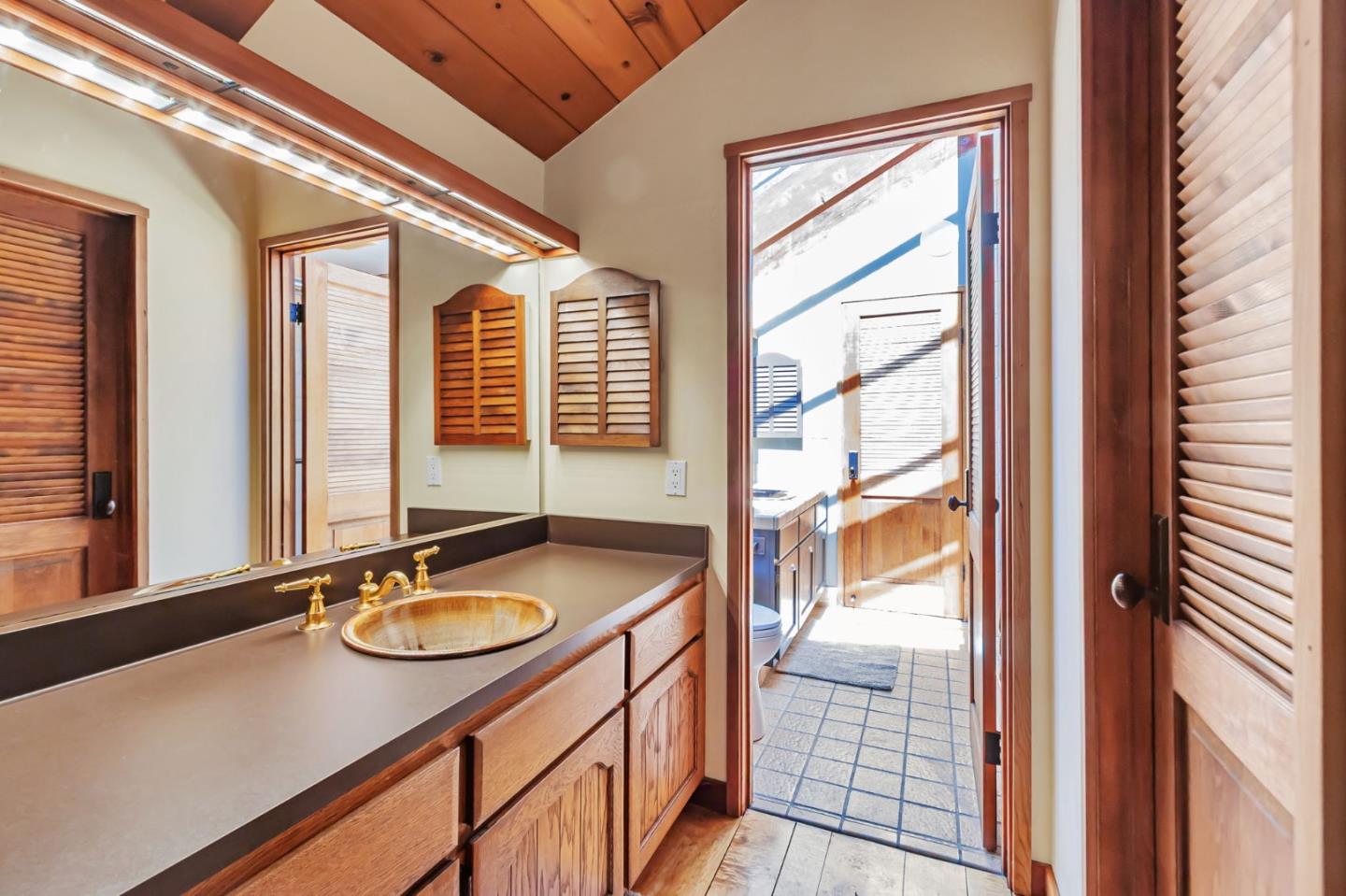 855 Oak Ridge Road Los Gatos, CA 95033 - Photo 44 of 73 a bathroom with a sink double vanity and a shower