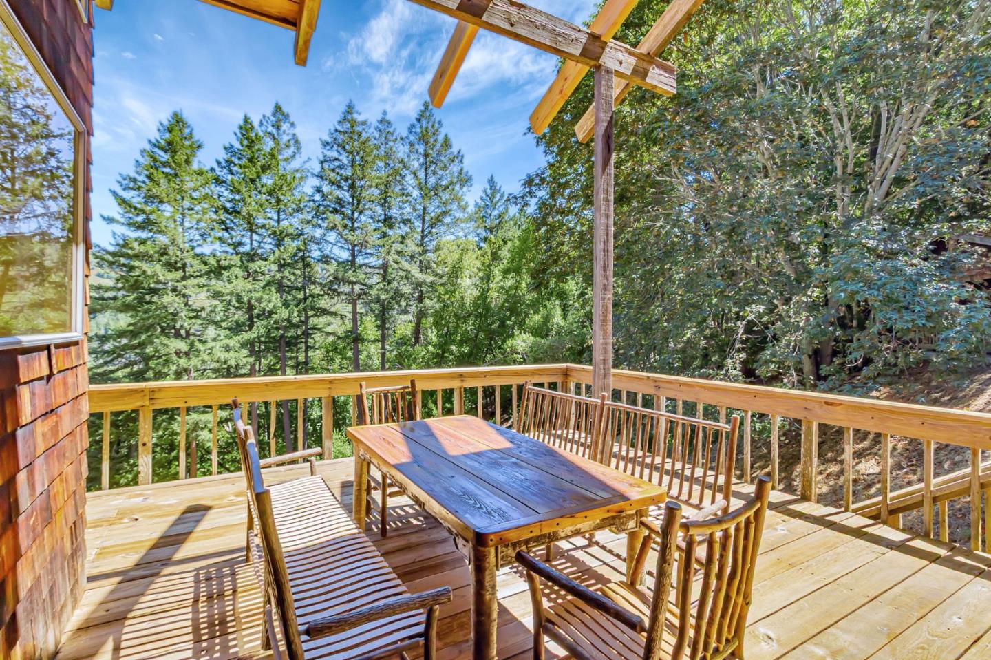 855 Oak Ridge Road Los Gatos, CA 95033 - Photo 58 of 73 a view of a balcony with wooden floor and outdoor seating