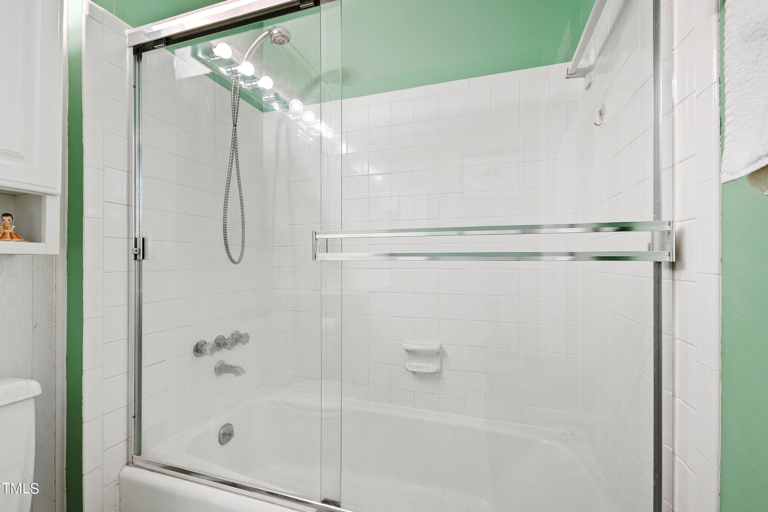 4832 Latimer Road Raleigh, NC 27609 - Photo 26 of 47 a bathroom with a shower