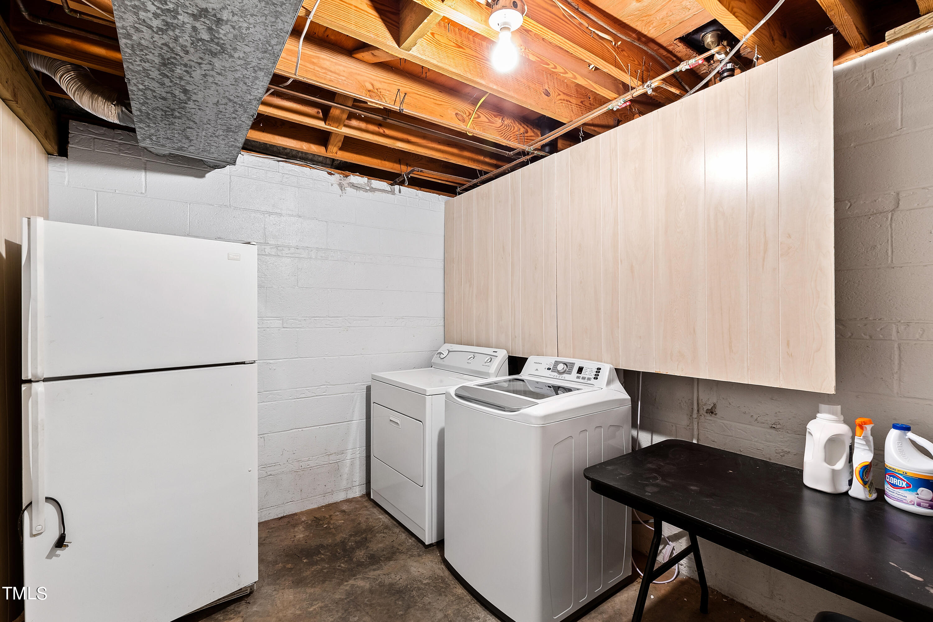 4832 Latimer Road Raleigh, NC 27609 - Photo 32 of 47 a utility room with dryer and washer