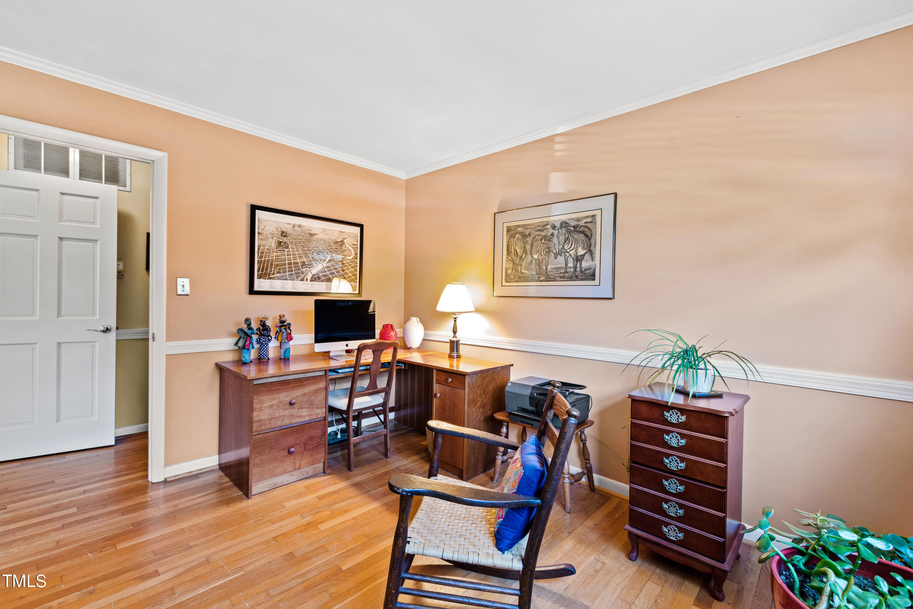 4832 Latimer Road Raleigh, NC 27609 - Photo 33 of 47 a view of a livingroom with furniture and a workspace