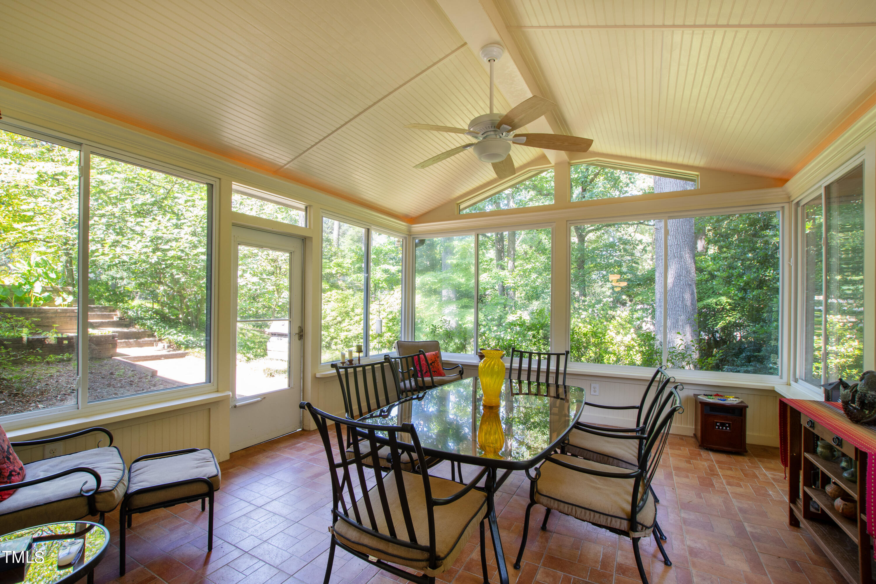 4832 Latimer Road Raleigh, NC 27609 - Photo 39 of 47 a view of a dining room with furniture window and outside view