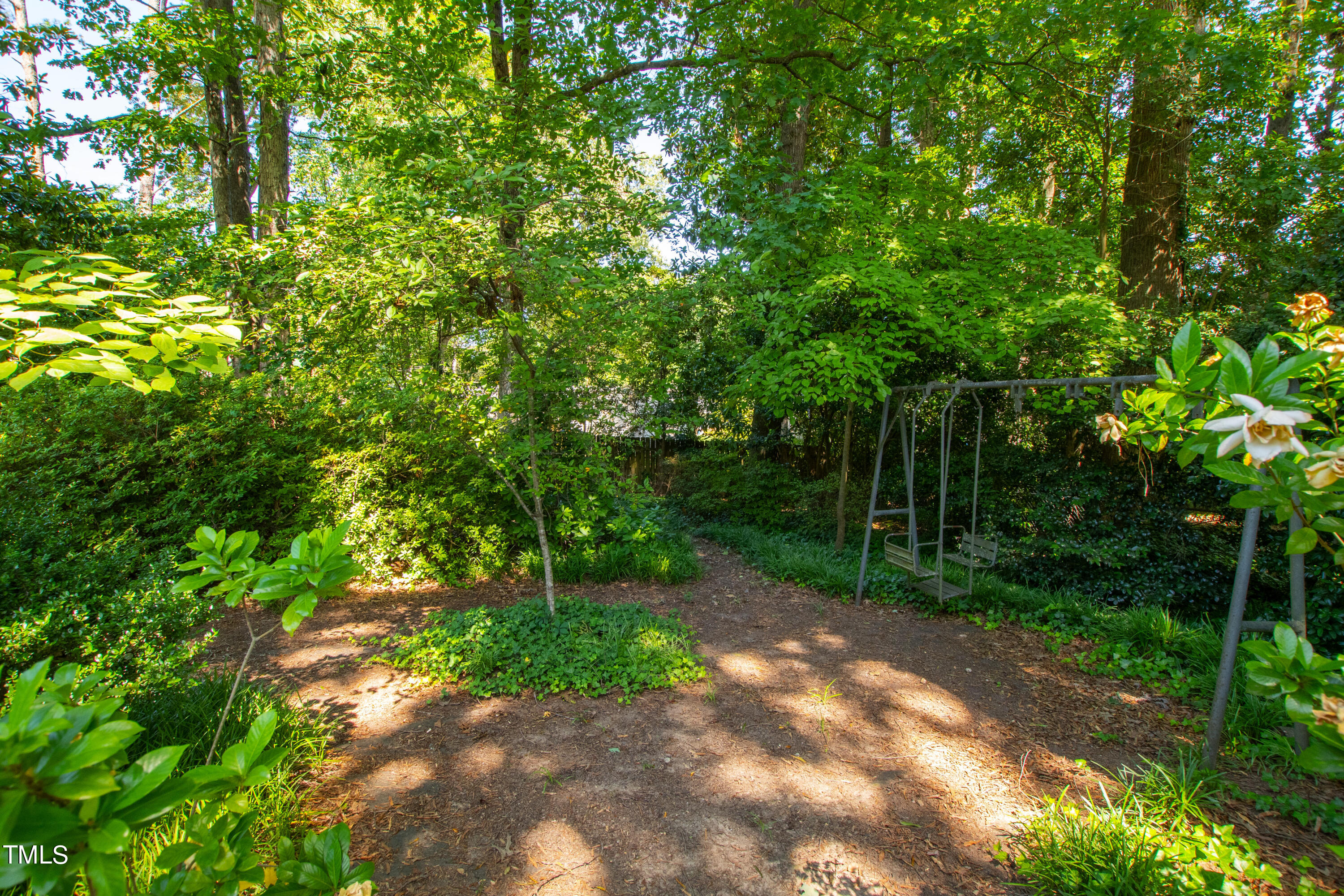 4832 Latimer Road Raleigh, NC 27609 - Photo 45 of 47 a view of a street with a tree