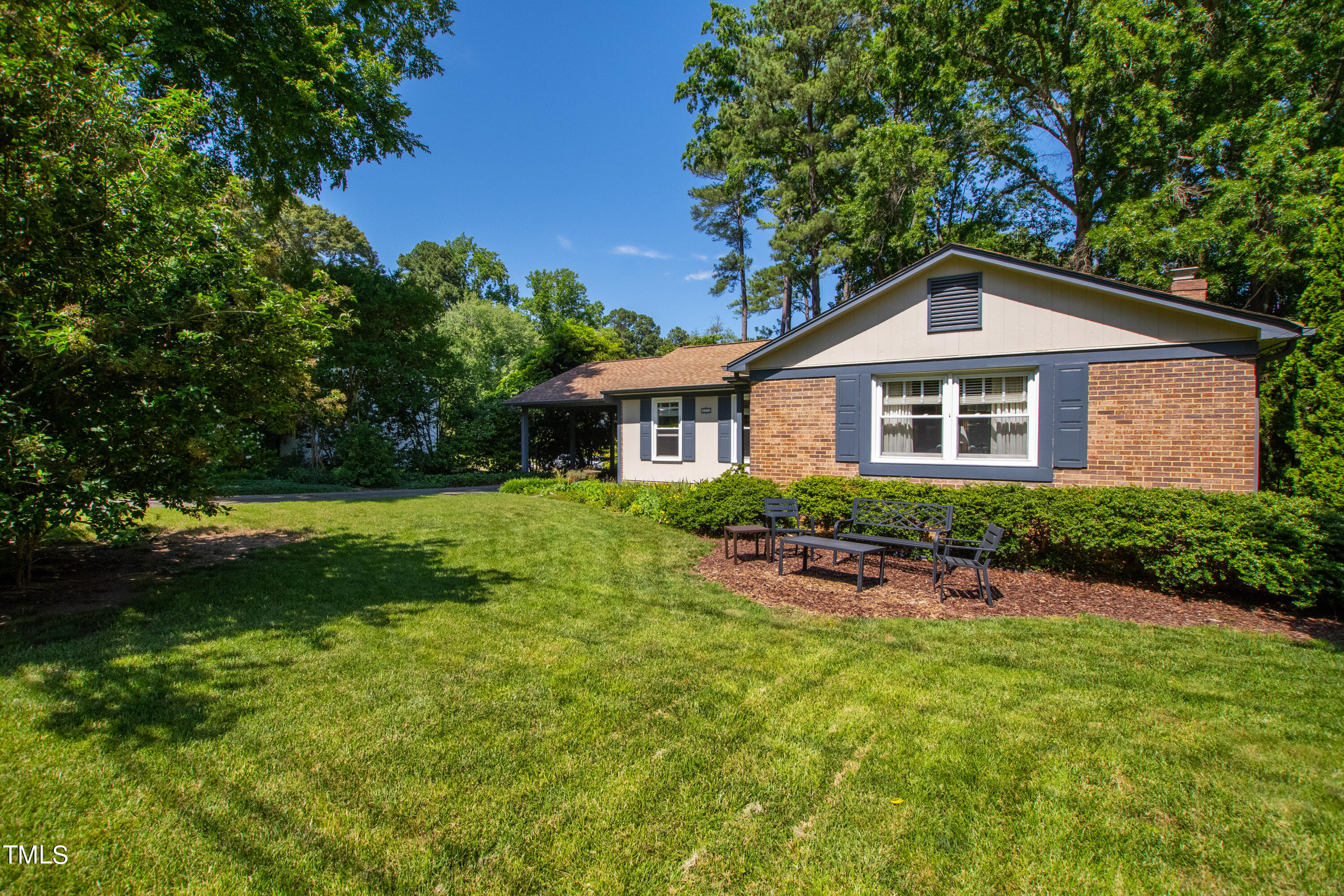 4832 Latimer Road Raleigh, NC 27609 - Photo 6 of 47 a front view of a house with a yard