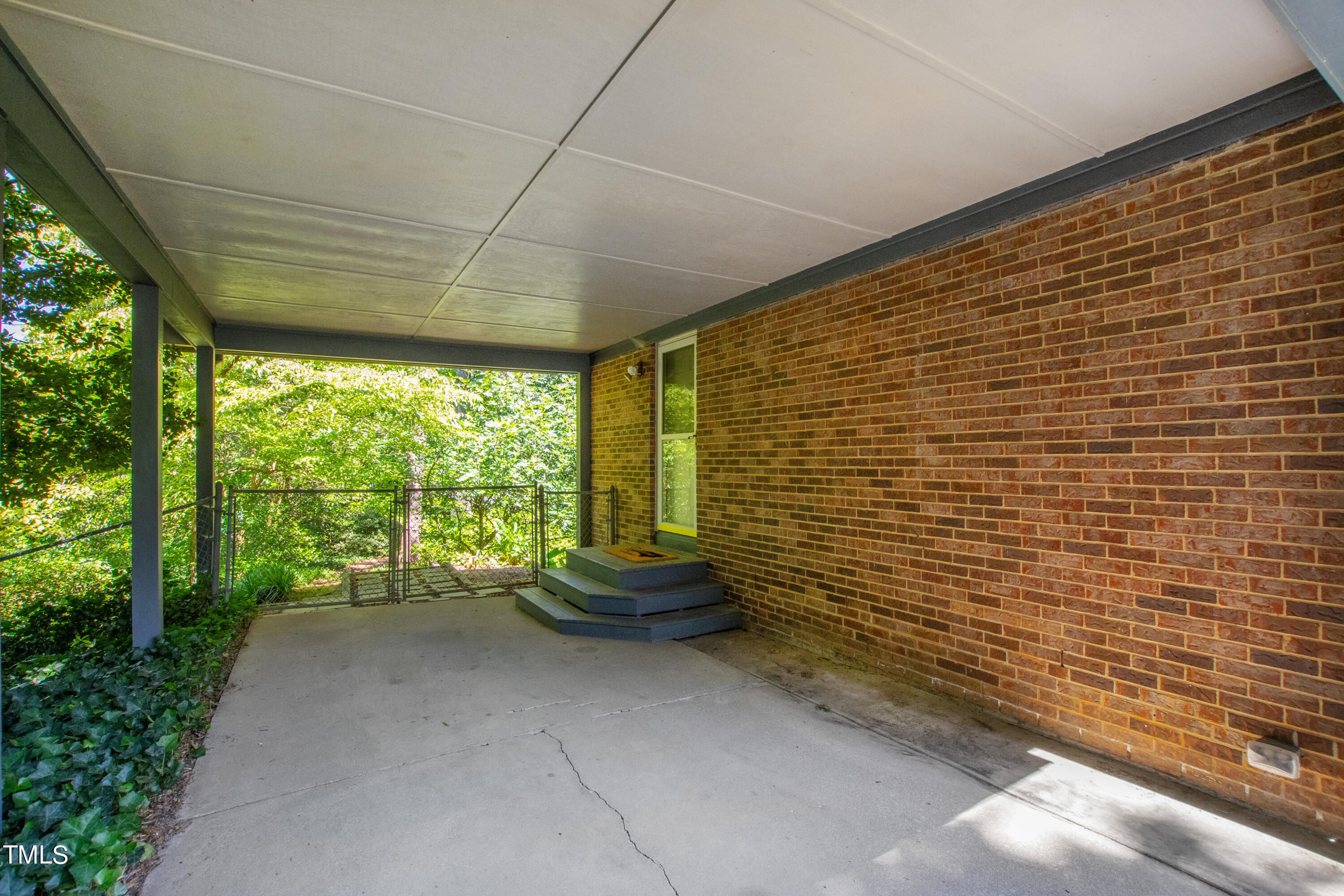 4832 Latimer Road Raleigh, NC 27609 - Photo 9 of 47 a view of outdoor space with porch