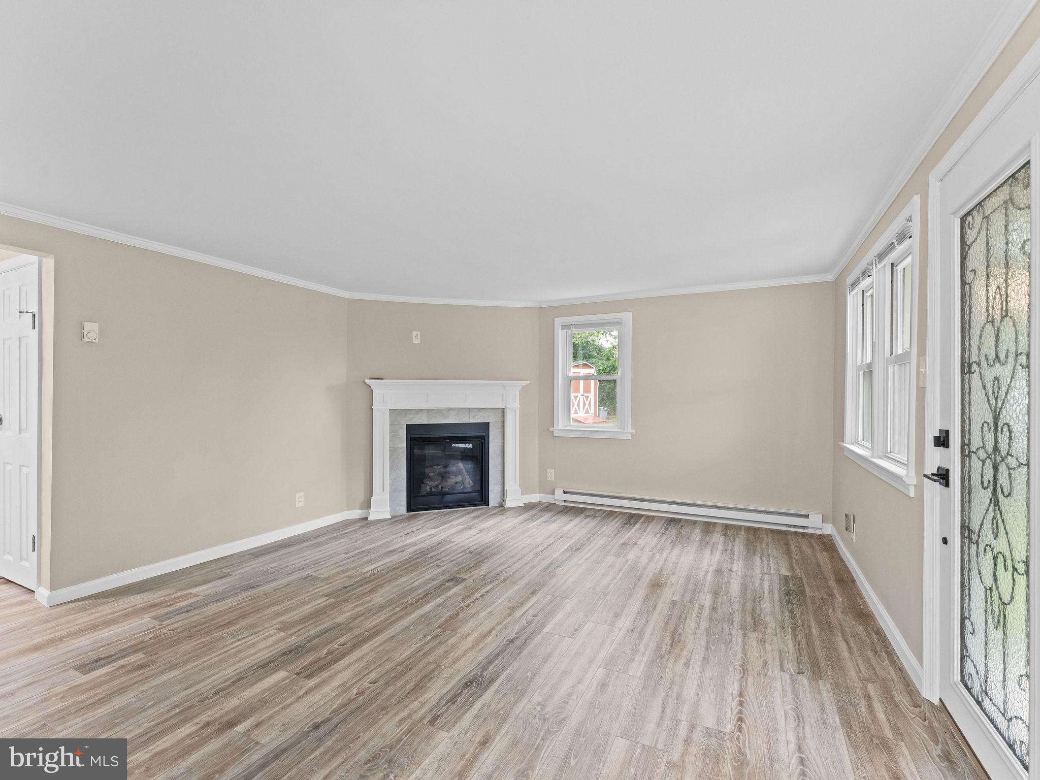 3395 Upper Valley Road Parkesburg, PA 19365 - Photo 7 of 56 Living Room with Propane Fireplace