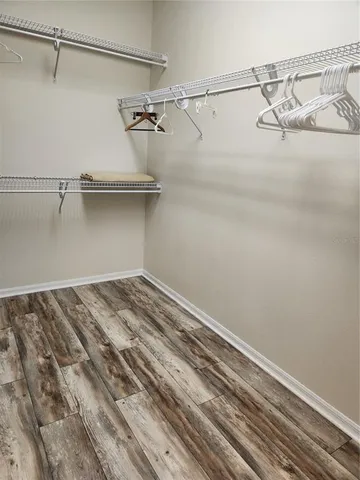 a view of a room with racks on the wall