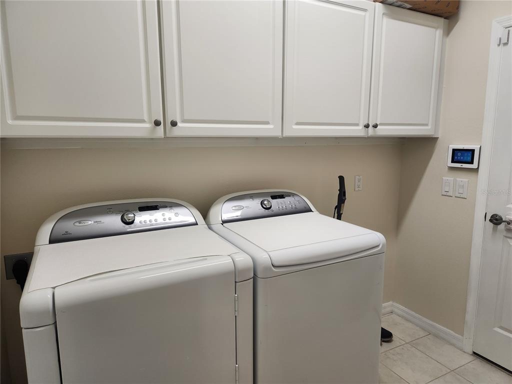 6496 Rookery Circle Bradenton, FL 34203 - Photo 30 of 40 a utility room with dryer and washer