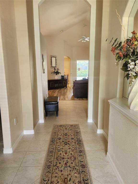 6496 Rookery Circle Bradenton, FL 34203 - Photo 3 of 40 a living room with furniture and a rug
