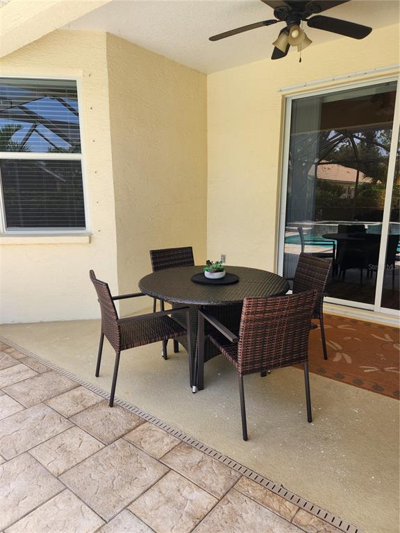 6496 Rookery Circle Bradenton, FL 34203 - Photo 32 of 40 a outdoor space with a couch and a stove