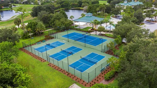 an aerial view of a house with pool