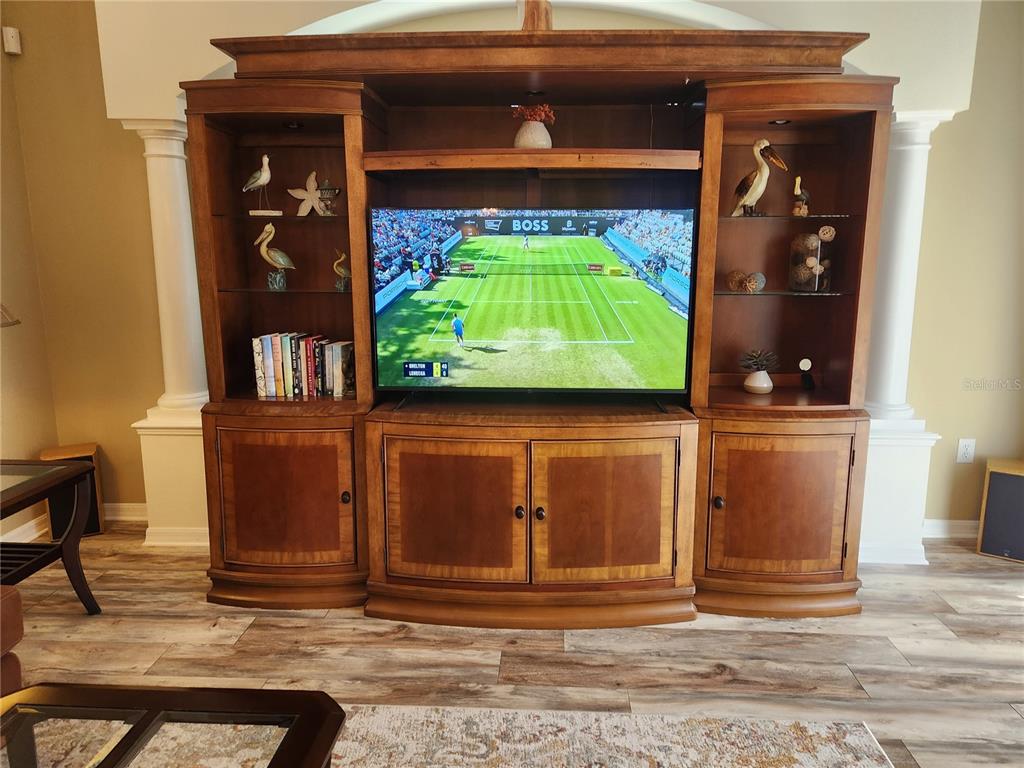 6496 Rookery Circle Bradenton, FL 34203 - Photo 10 of 40 a front view of a house with a garden and plants