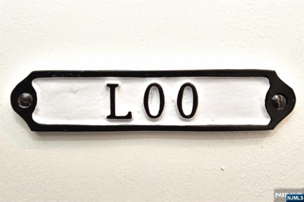 12-64 Burbank Street Fair Lawn, NJ 07410 - Photo 19 of 34 a close up of a street sign