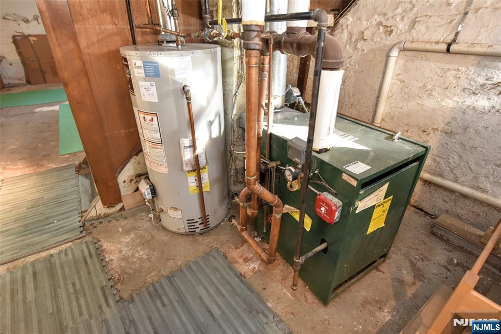 12-64 Burbank Street Fair Lawn, NJ 07410 - Photo 28 of 34 a view of water heater room