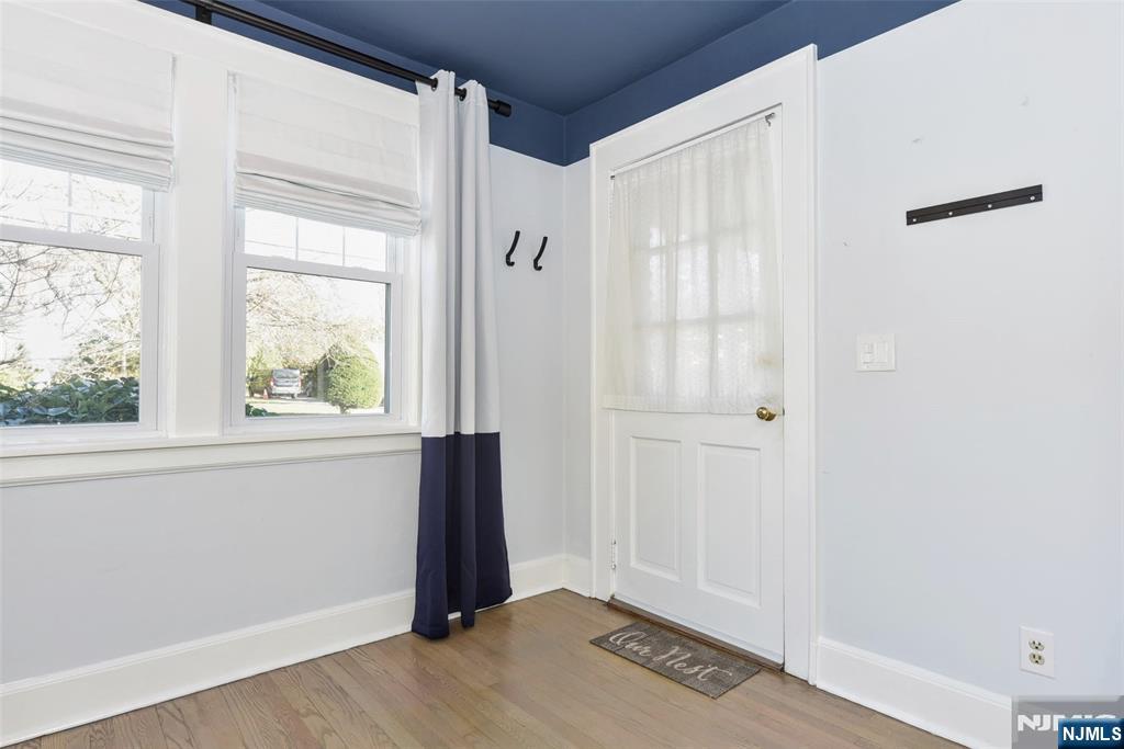 12-64 Burbank Street Fair Lawn, NJ 07410 - Photo 4 of 34 a view of an empty room with a window