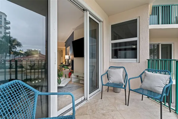 a view of balcony with patio