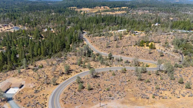 a view of a wooden floor with a lake view