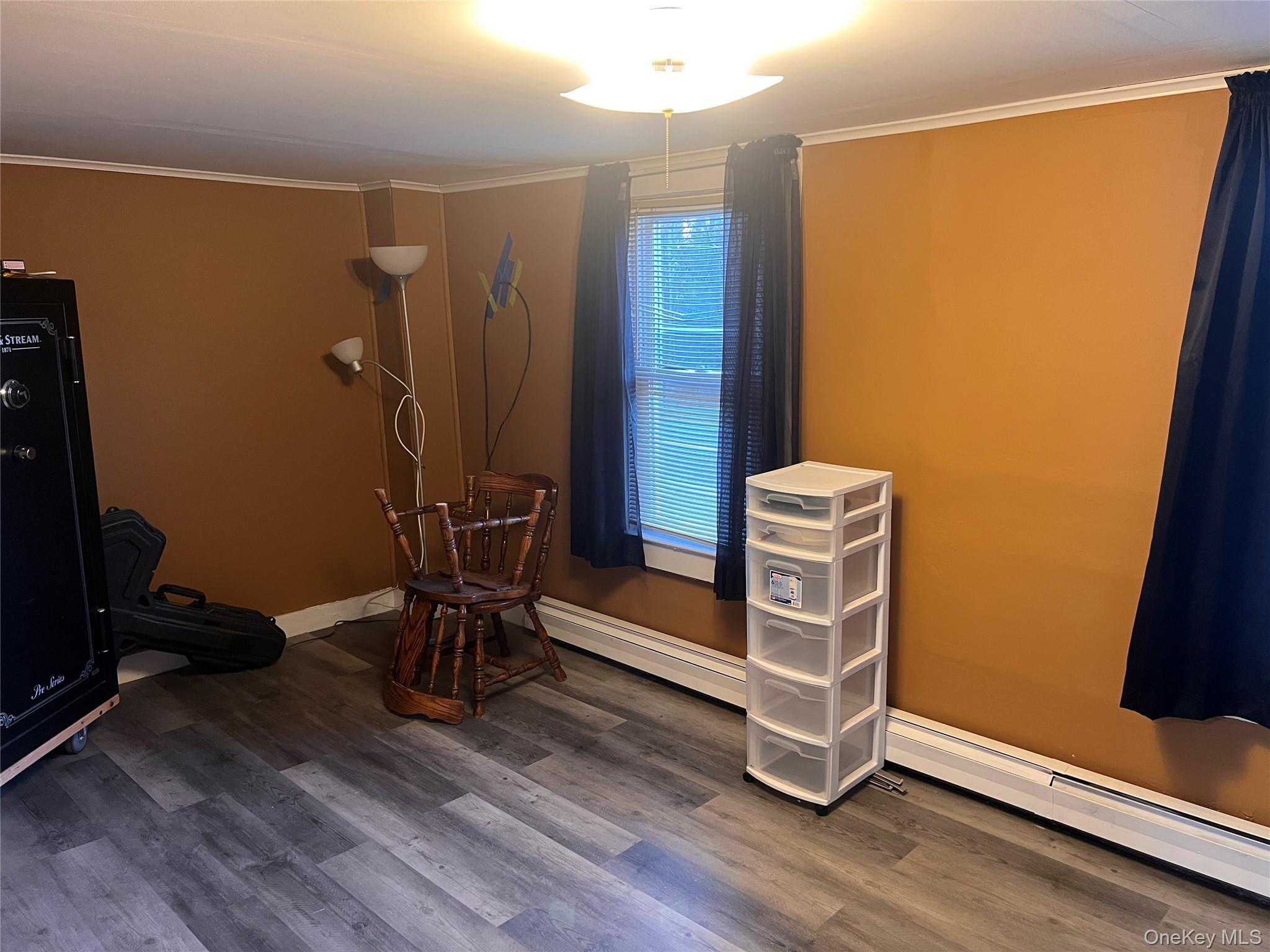 279 Cold Spring Road Monticello, NY 12701 - Photo 13 of 32 a view of a room with gym equipment