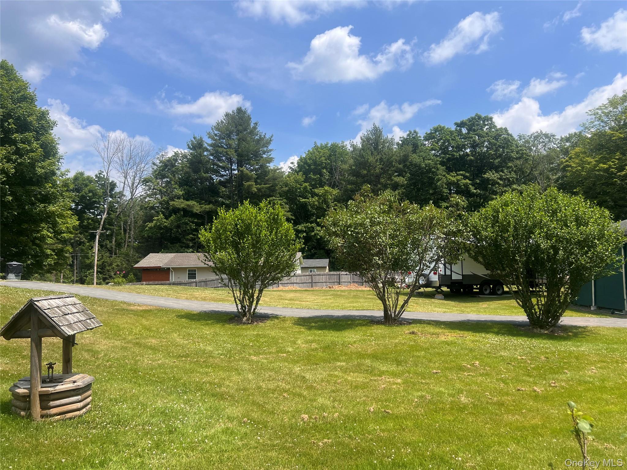 279 Cold Spring Road Monticello, NY 12701 - Photo 23 of 32 a view of a park with large trees
