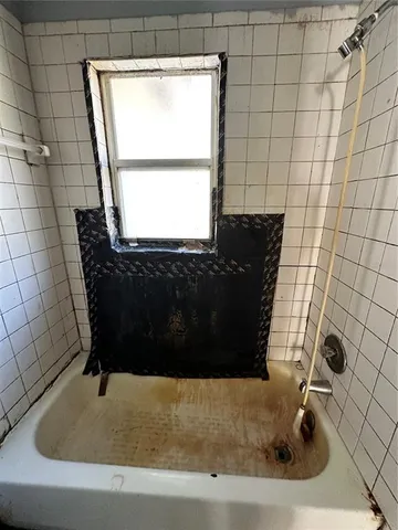 a bathroom with a bathtub