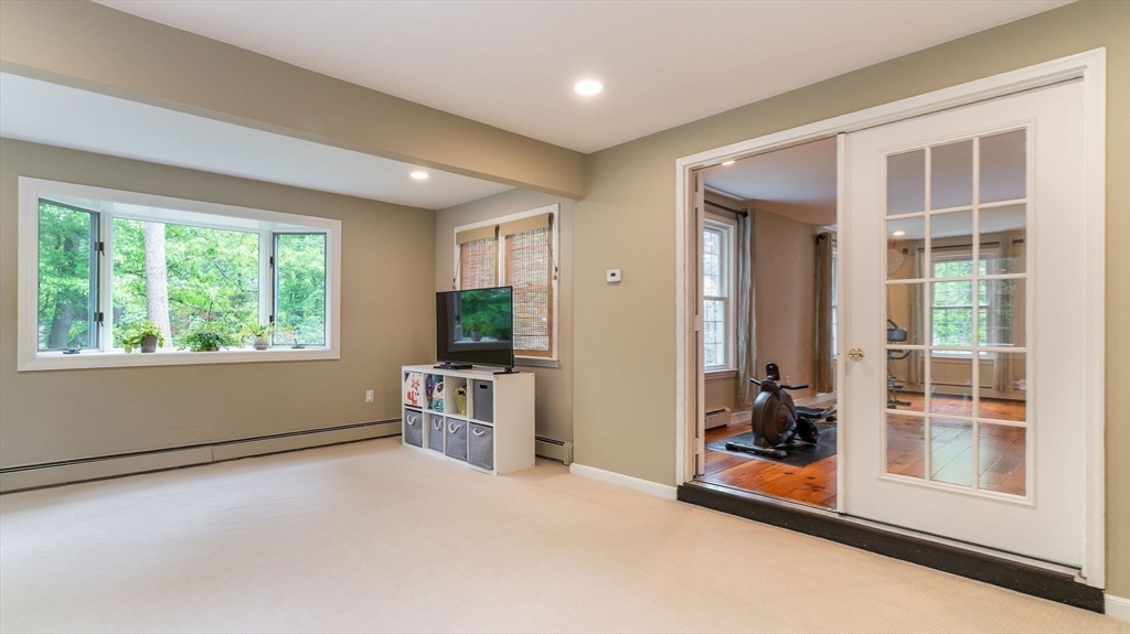 142 Baker Street Walpole, MA 02081 - Photo 24 of 42 a view of a room with a large window and walk in closet