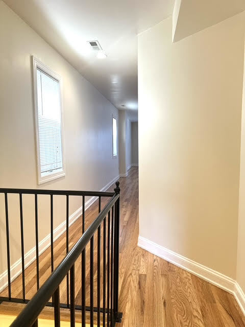 25 East 26th Street, Unit 5 Chicago, IL 60616 - Photo 9 of 11 a view of hallway with stairs