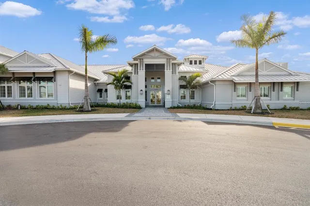 a view of an ocean with a building in the background