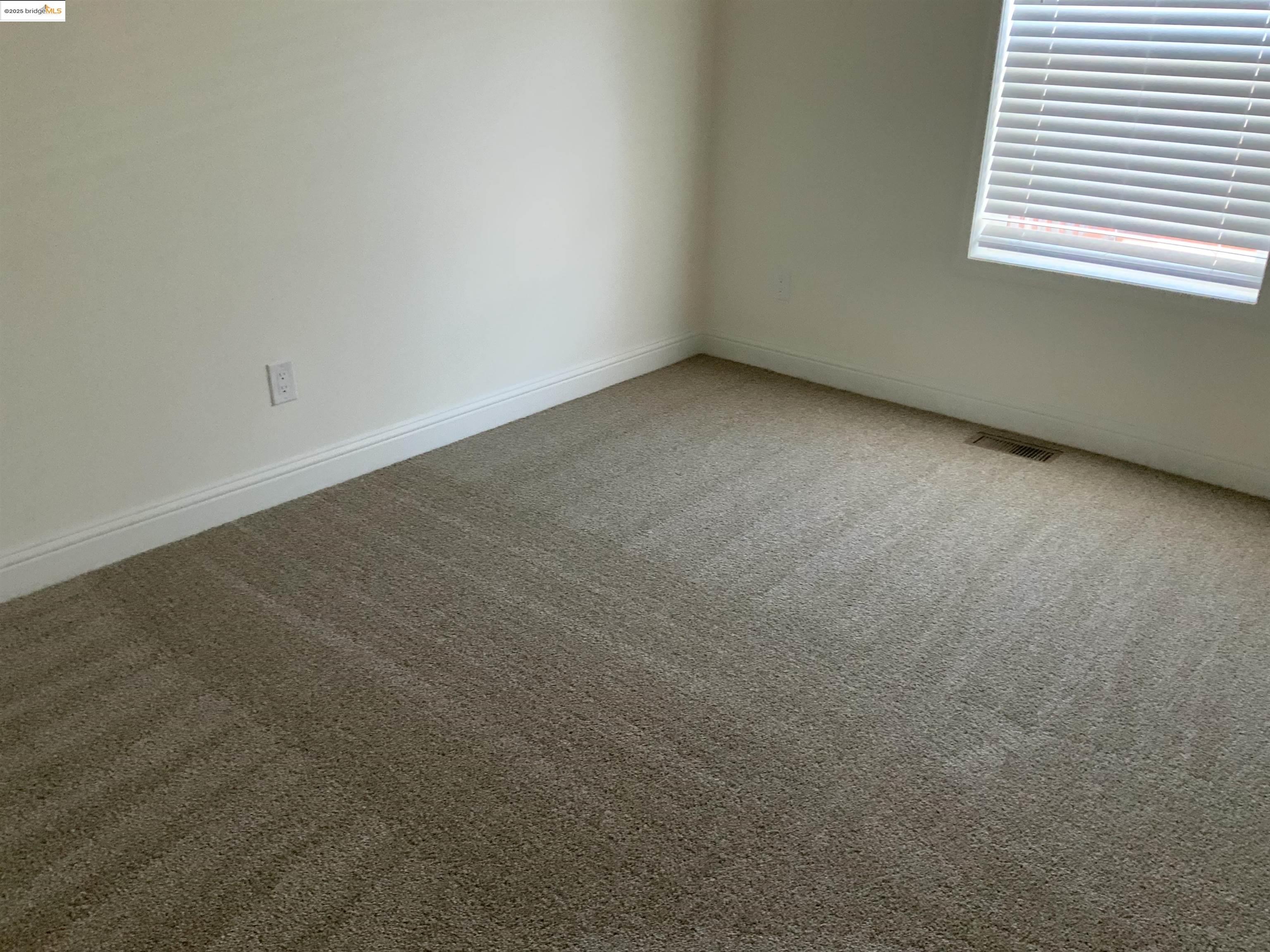 77 Hilo Drive Pittsburg, CA 94565 - Photo 12 of 23 a view of a room that has a window in it