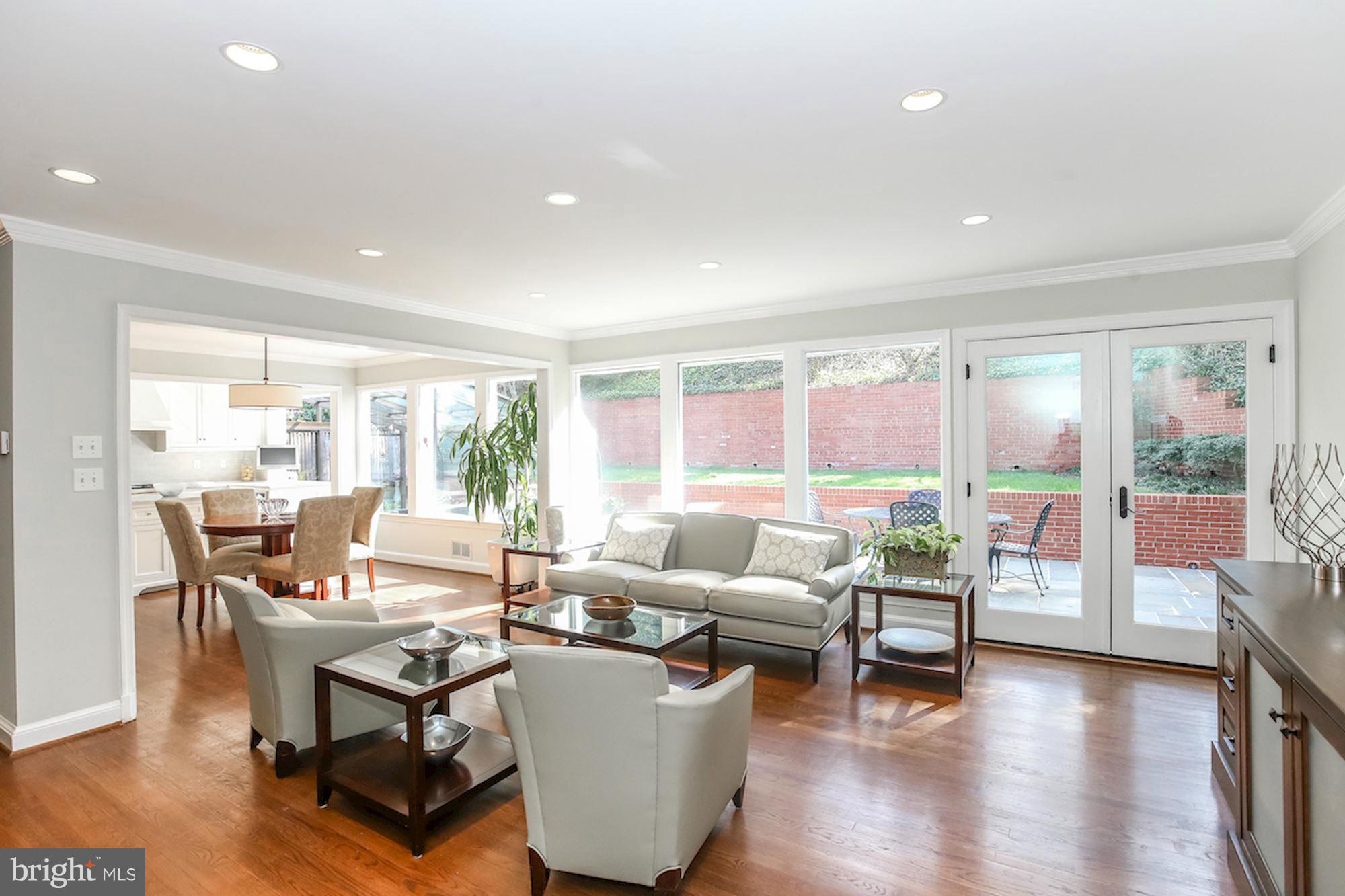 2347 49th Street Northwest Washington, DC 20007 - Photo 2 of 29 a living room with furniture and a large window