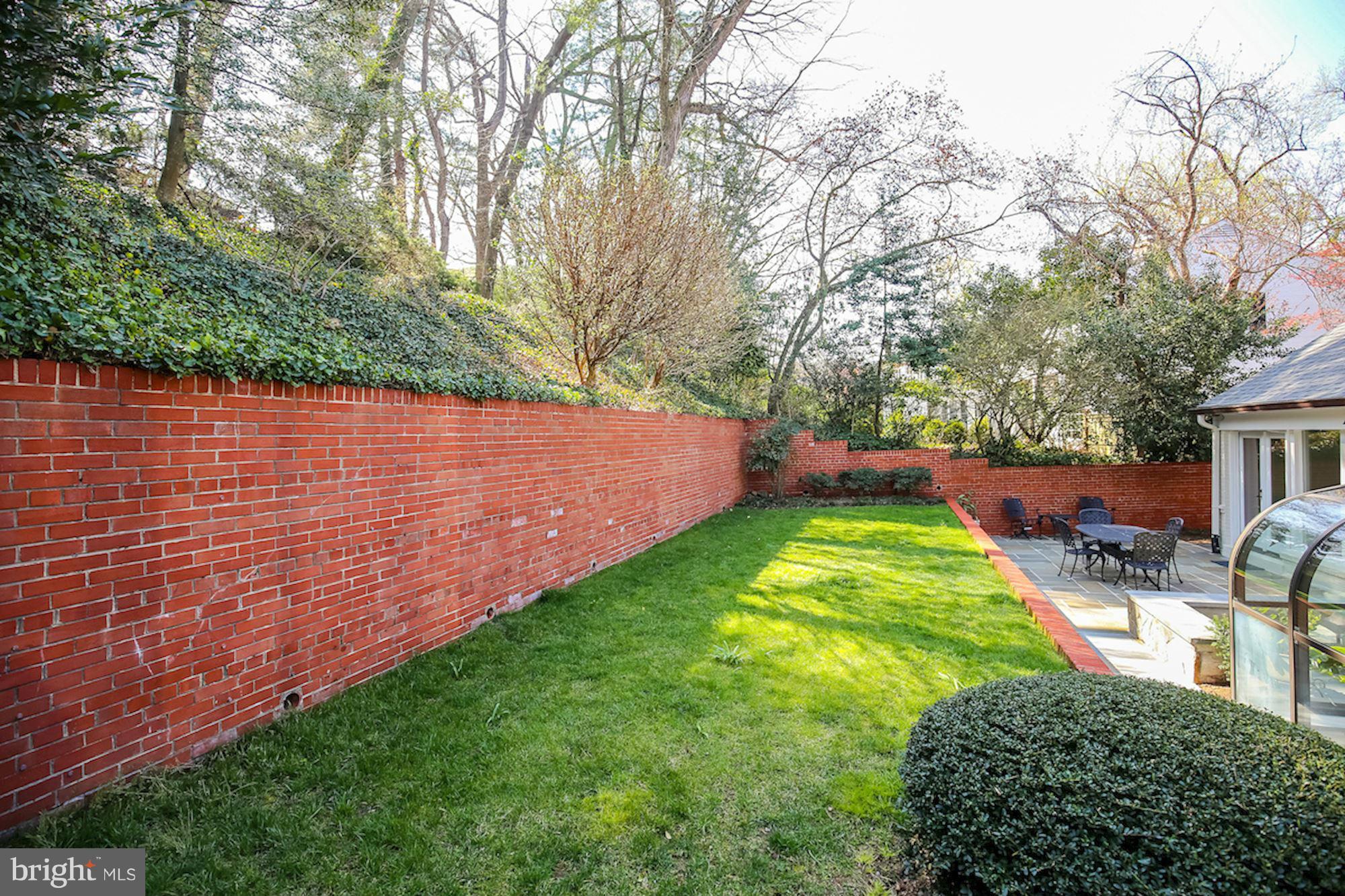 2347 49th Street Northwest Washington, DC 20007 - Photo 12 of 29 a view of yard with swimming pool and green space