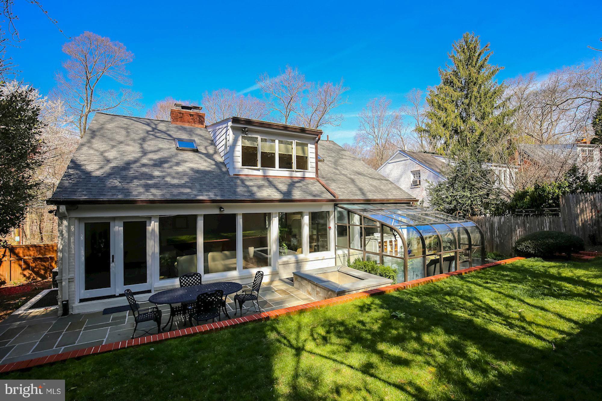 2347 49th Street Northwest Washington, DC 20007 - Photo 15 of 29 a view of a house with backyard porch and sitting area